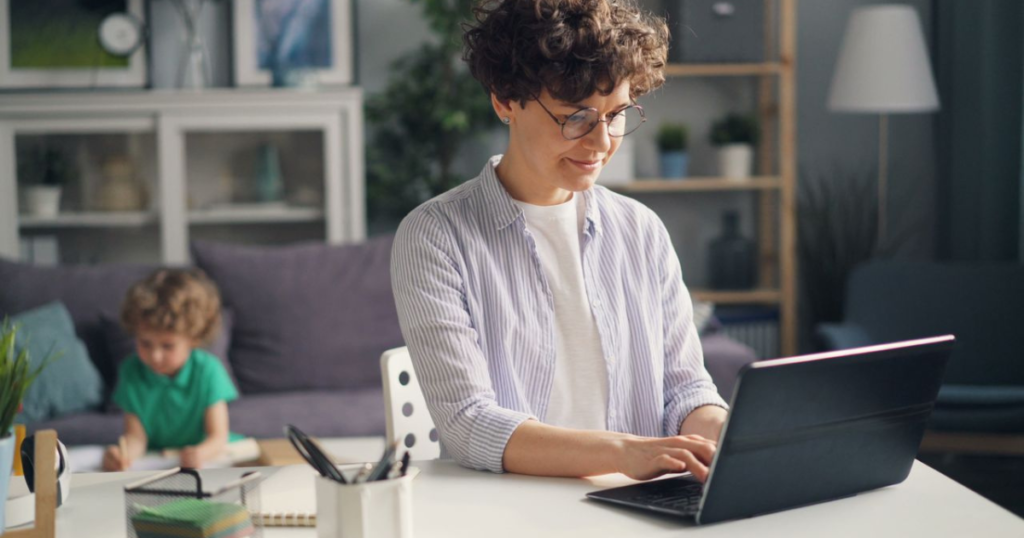 Stay at home mom working on a laptop during child's nap time