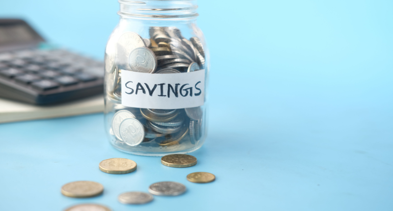 Teenager saving money and budgeting side hustle earnings