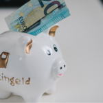 how to save money for holidays piggy bank with christmas decorations