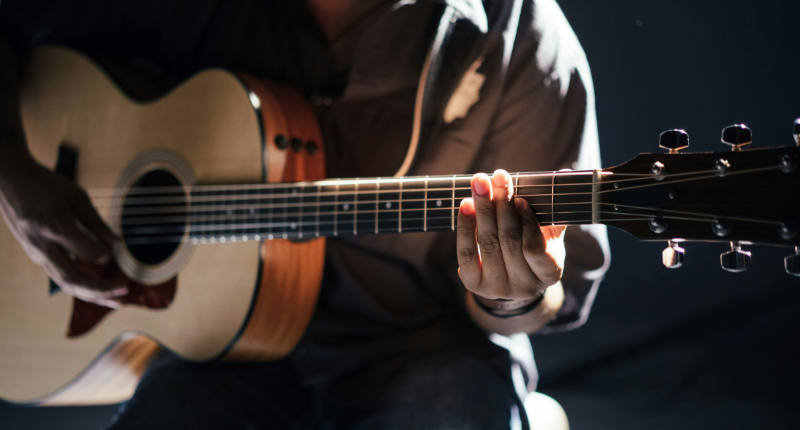 Teacher performing live music as a weekend side hustle