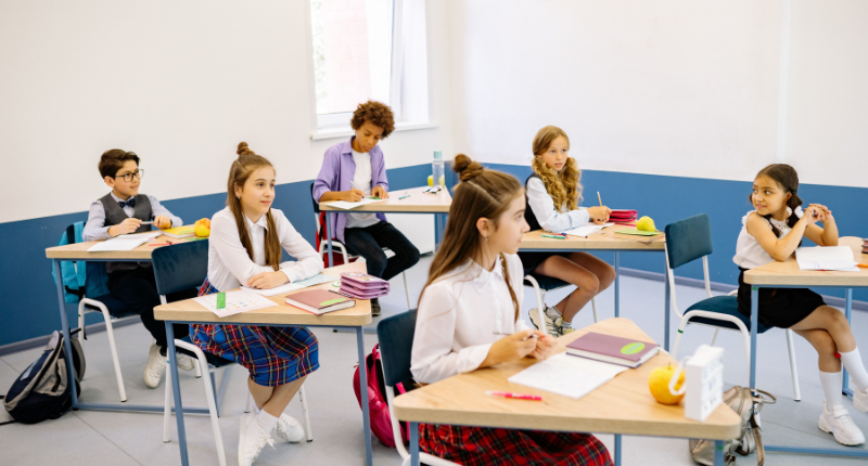 Teacher leading a summer school classroom session